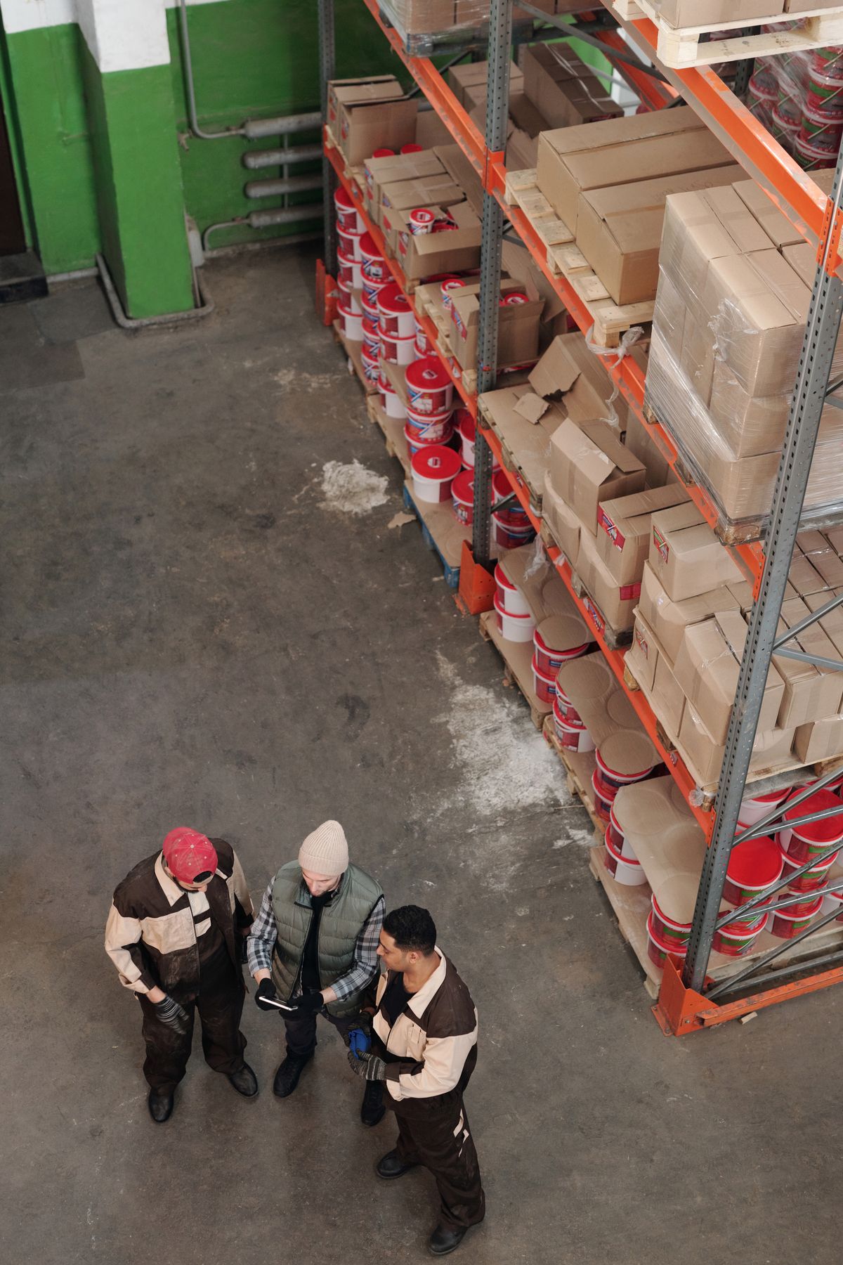 Warehouse staff coordinating inventory and logistics